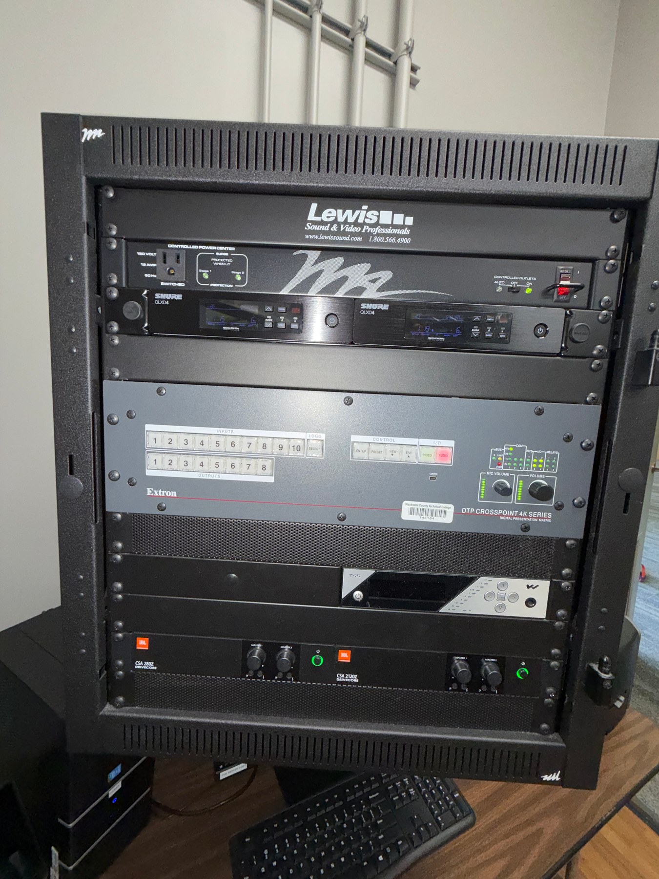 Previous Classic Room equipment rack before the Q-SYS system installation